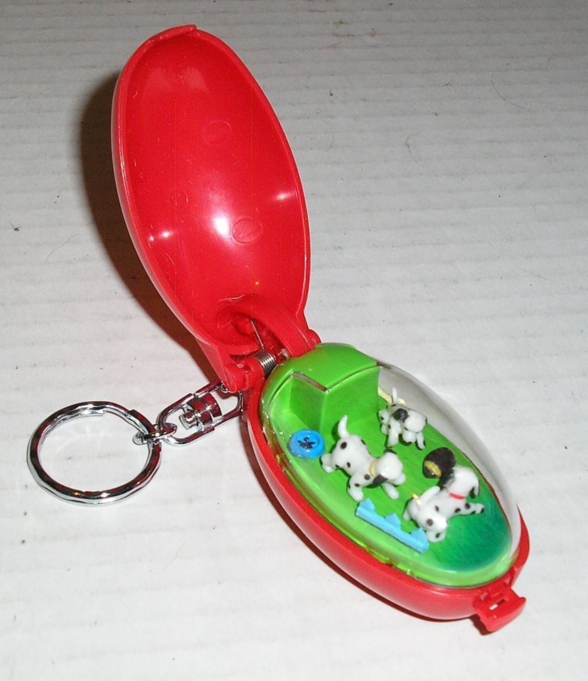 TOMY animatronic egg-shaped keychain thing